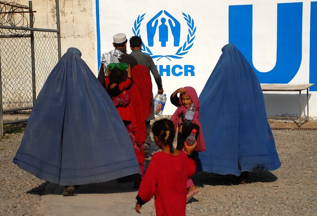 Afghan refugee families living in Pakistan arrive at the UNHCR’s repatriation center in Peshawar, before returning to Afghanistan. AP/Mohammad Sajjad