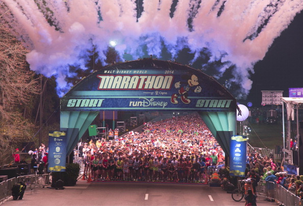 LAKE BUENA VISTA, FL - JANUARY 12: In this handout photo provided by Disney Parks, 26,000 runners participate in the 2014 Walt Disney World Marathon presented by runDisney on January 12, 2014 in Lake Buena Vista, Florida. The 26.2 mile race goes through all four Walt Disney World theme parks capping off running events throughout the weekend. (Photo by Preston Mack/Disney Parks via Getty Images)