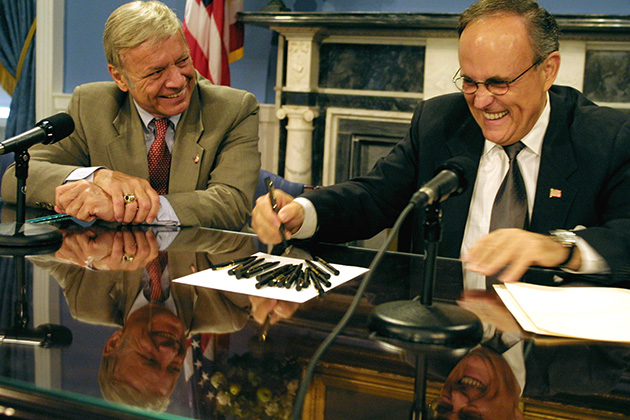 Then-Council Speaker Peter Vallone, left, and New York City Mayor Rudolph Giuliani during a bill signing in 2001 (AP Photo/Diane Bondareff)