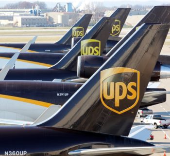 United Parcel Service air craft are being loaded with air containers full of packages bound for their final destination at the UPS Worldport All Points International Hub during the peak delivery month in Louisville, Kentucky December 3, 2015. REUTERS/John Sommers II