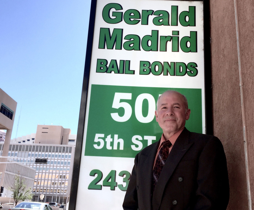 Bail bondsman Gerald Madrid, standing outside his Albuquerque office, thinks New Mexico’s money bail system does not need to be reformed.