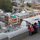 Children look down from the Royal Palace in Leh, the largest town in the region of Ladakh, nestled high in the Indian Himalayas, India September 26, 2016. REUTERS/Cathal McNaughton