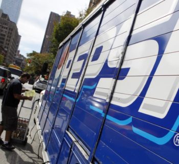 Workers unload a truck of Pepsi products in New York's Hell's Kitchen neighborhood, October 8, 2009.  REUTERS/Chip East