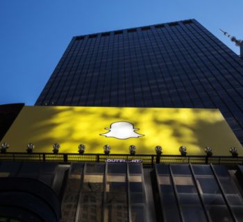A billboard displays the logo of Snapchat above Times Square in New York March 12, 2015. REUTERS/Lucas Jackson/File Photo