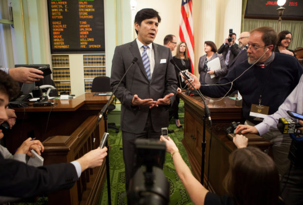 FILE PHOTO - Senate President pro tem Kevin de Leon speaks to reporters after Gov. Jerry Brown's historic fourth inauguration at the State Capitol in Sacramento, CA, U.S. on January 5, 2015.  REUTERS/Max Whittaker/File Photo