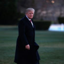 U.S. President Donald Trump walks from Marine One as he returns to the White House in Washington. REUTERS/Joshua Roberts