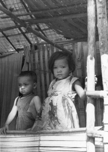Nang Khamphounta, the mother of these children described how the children's father, Thit Boun Thong, was killed by "big bombs" from a T-28 aircraft in August 1969.   "Thit Boun Thong had been working in the rice field and did not reach the holes in time when the planes came over. He was killed. There were no soldiers around when the planes bombed.   I can't remember how many times the planes came over in a day because when they came over I was very frightened. Every time I heard the sound of a plane I fled for the holes."