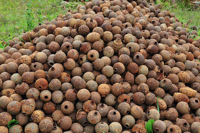 Piles of unexploded ordnance  A pile of unexploded ordnance (UXO) that have been cleared. Since more than one third of the land in Laos is contaminated with UXO, the Lao government has prioritized clearing populated areas and land that can be used for agriculture.