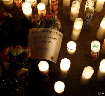 A note is pictured at a pop-up memorial in San Bernardino, California December 4, 2015, following Wednesday's attack.   REUTERS/Mario Anzuoni