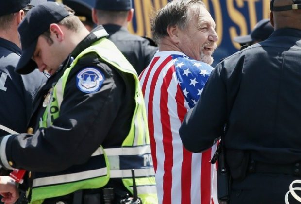 One has to wonder why Beltway reporters, self-proclaimed political junkies, have such a profound lack of interest in a story about people willing to be arrested on the steps of the nation's Capitol in order to protest the role of money in politics. (Photo: Mark Wilson/Getty Images)