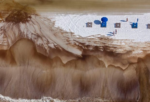 National Geographic aerial photo of Deepwater Horizon oil covering an Alabama beach. (Photo: Tyrone Turner)