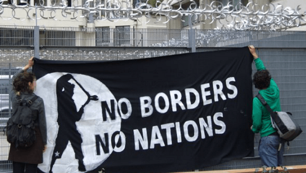 Activists protest a migrant detention center in London. (Photo: noborder.org)