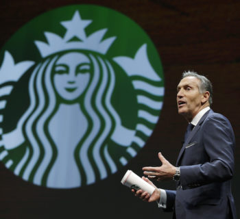FILE - In this Wednesday, March 23, 2016, file photo, Starbucks CEO Howard Schultz speaks at the coffee company's annual shareholders meeting in Seattle. Starbucks reports financial results Thursday, April 21, 2016. (AP Photo/Ted S. Warren, File)
