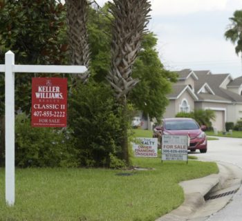 For Sale signs stand in front of houses in a neighborhood where many British people have purchased homes in Davenport, Florida, U.S., June 29, 2016.  REUTERS/Phelan Ebenhack