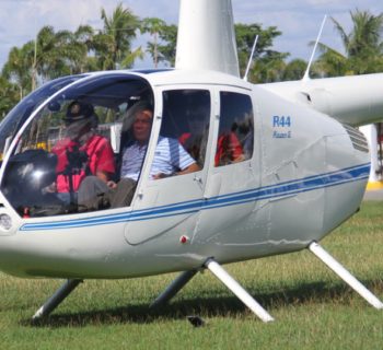 File photo - Then-local mayor of Davao city Rodrigo Duterte (R), aboard a helicopter, arrives at the provincial capitol in Tagum city, Davao del Norte, southern Philippines for the Regional Peace and Order Council meeting, April 20, 2015. REUTERS/Lean Daval Jr.